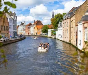 Are Guided Boat Rides Through Bruges Canals Year-Round?